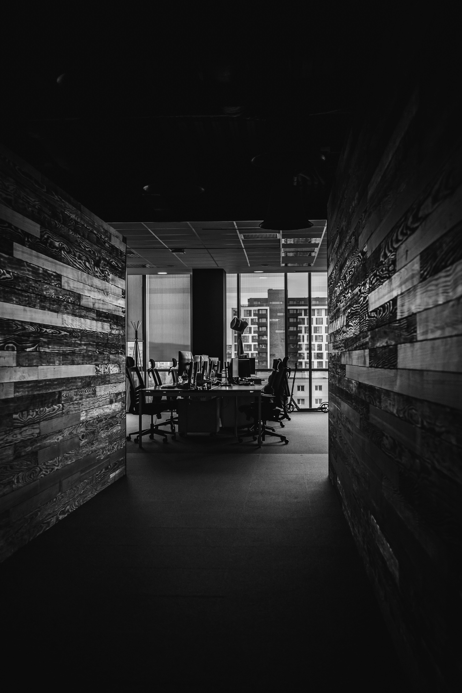 Office workspace with natural light and shadow
